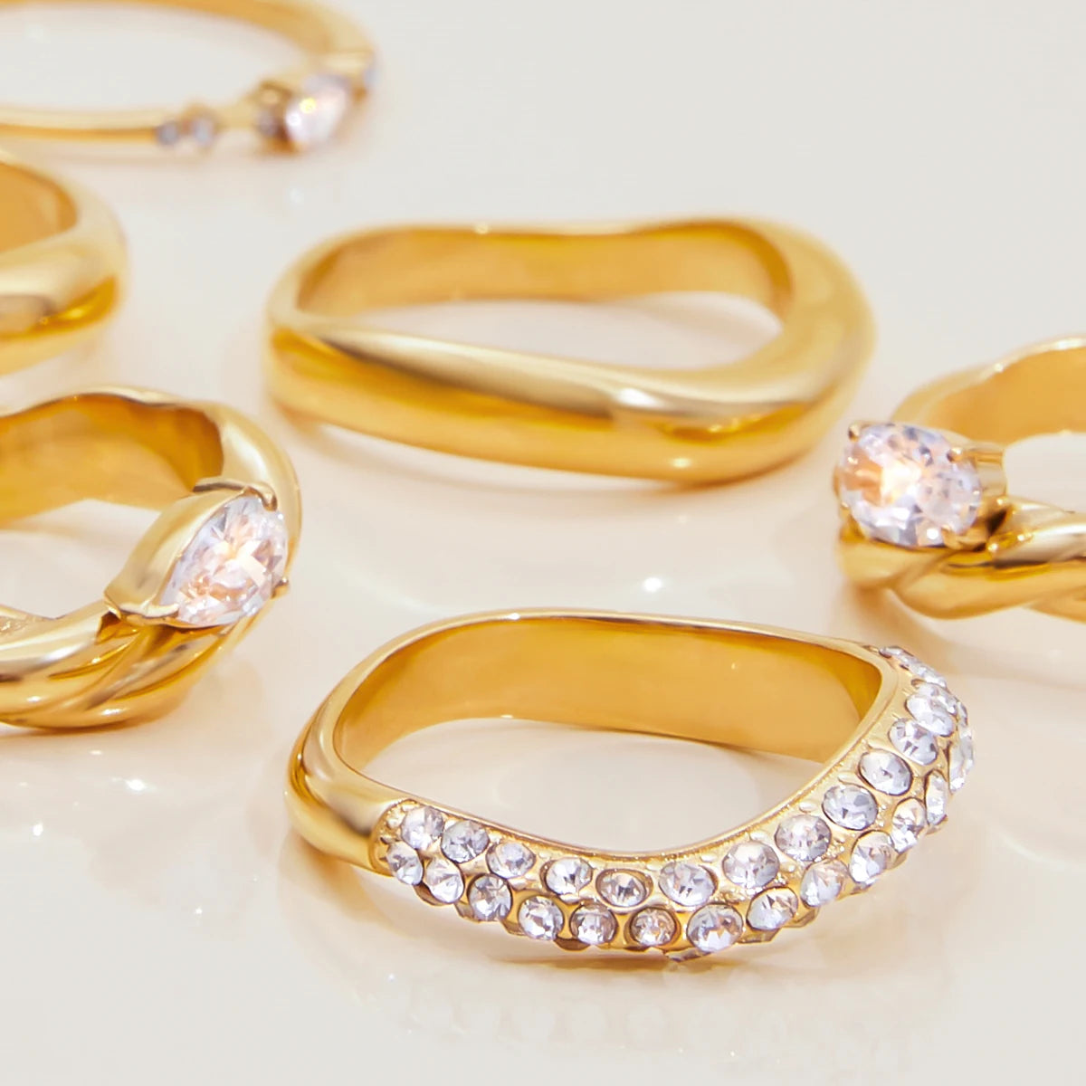 J&D 18K PVD Gold Plated Stainless Steel Rings Classic Trendy White Zircon Oval Braided Pattern Ring