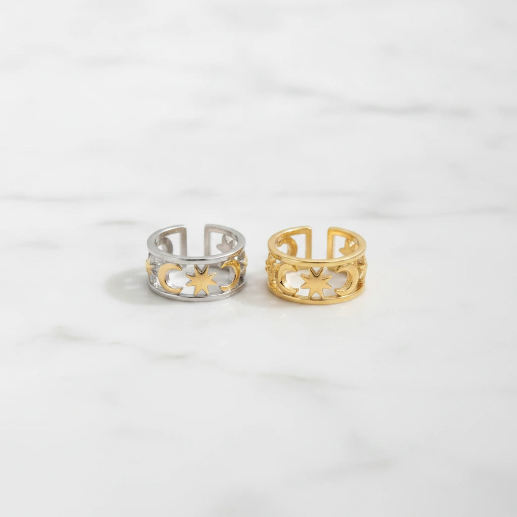 PALERMO RINGS | Place the original product large and centered on a clean white marble surface with a matching white marble background.