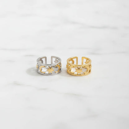 PALERMO RINGS | Place the original product large and centered on a clean white marble surface with a matching white marble background.