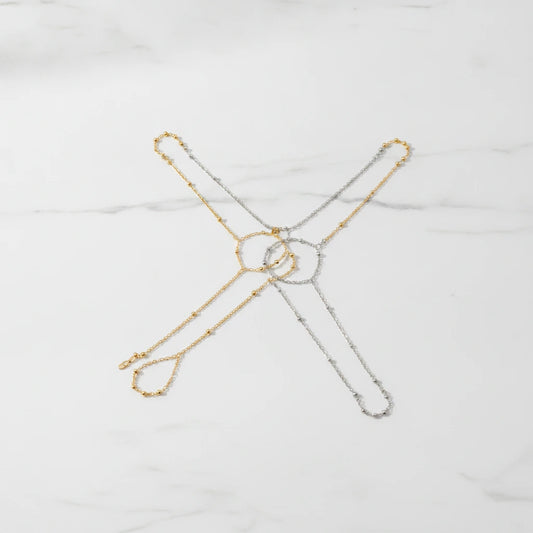 PORTOFINO BRACELET | Place the original product large and centered on a clean white marble surface with a matching white marble background.