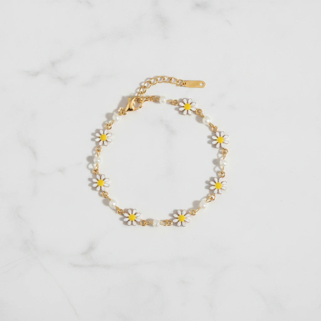 SORRENTO BRACELET | Place the original product large and centered on a clean white marble surface with a matching white marble background.