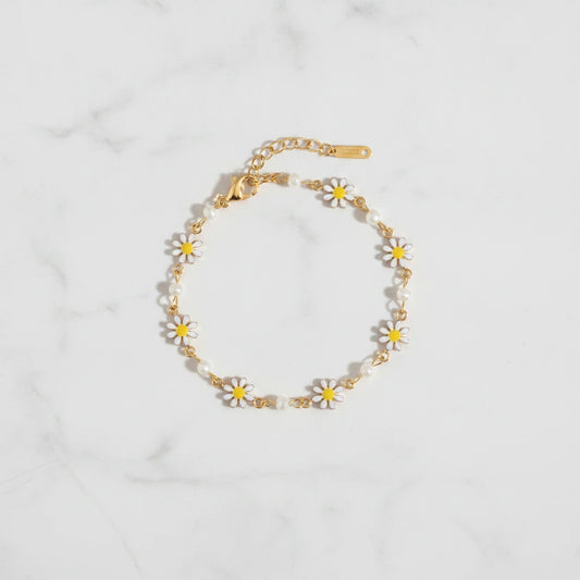 SORRENTO BRACELET | Place the original product large and centered on a clean white marble surface with a matching white marble background.