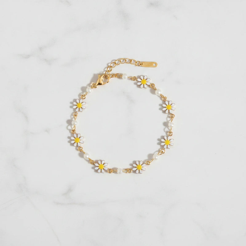 SORRENTO BRACELET | Place the original product large and centered on a clean white marble surface with a matching white marble background.