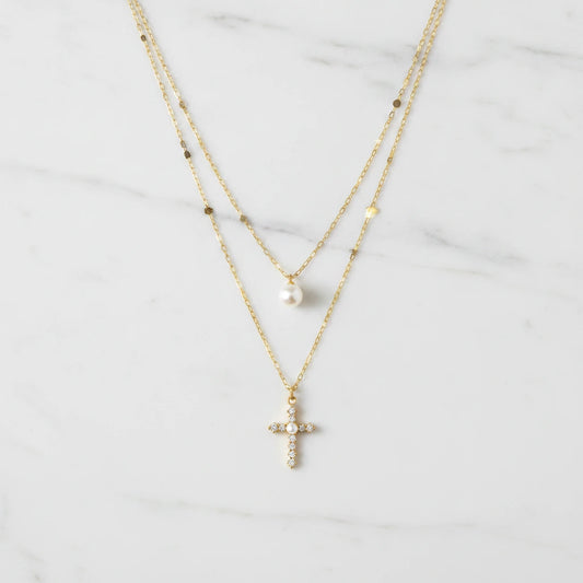 STELLA NECKLACE | Place the original product large and centered on a clean white marble surface with a matching white marble background.