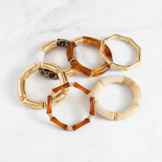 VERONA BRACELET | Place the original product large and centered on a clean white marble surface with a matching white marble background.