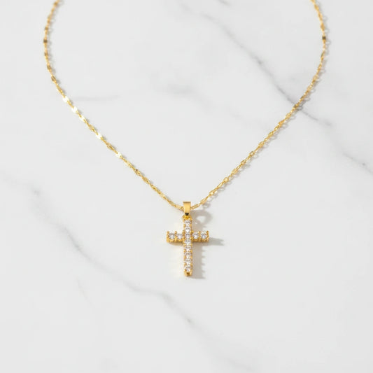 VIVIENNE NECKLACE | Place the original product large and centered on a clean white marble surface with a matching white marble background.